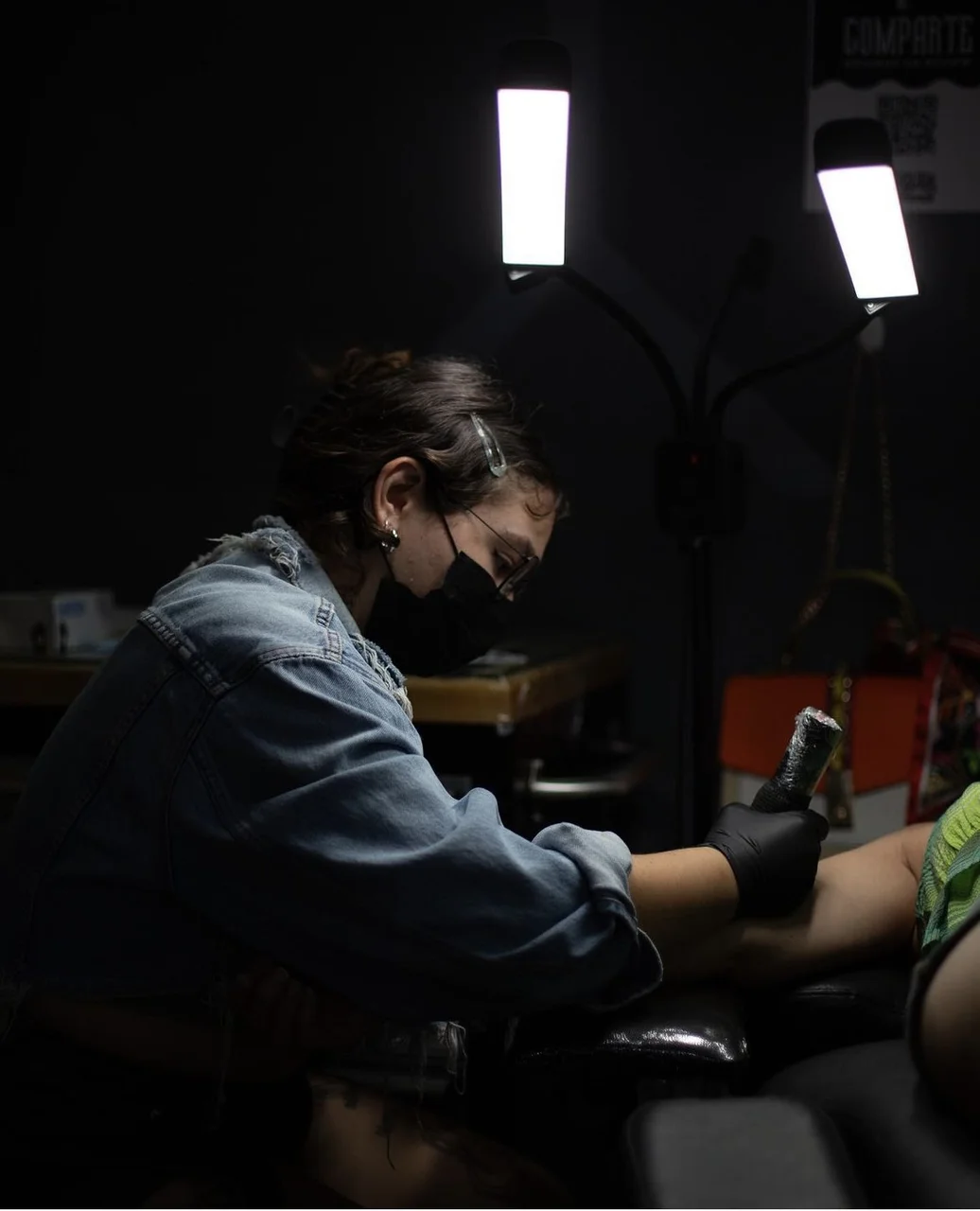 Claudia consulting with client in relaxed studio seating